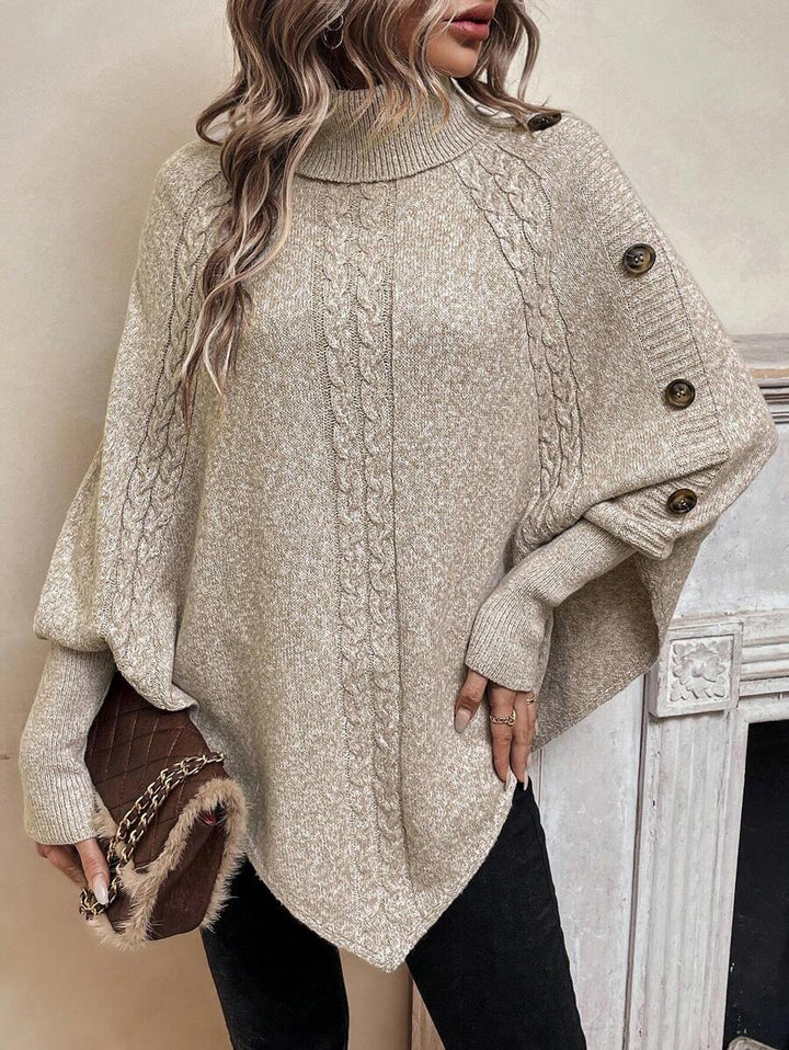 Alexis | Poncho-Sweater mit hohem Kragen und Fledermausärmeln, asymmetrischer Kabelstrick-Pullover
