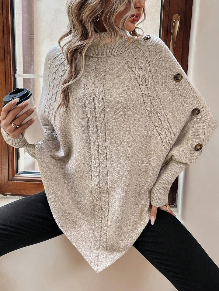 Alexis | Poncho-Sweater mit hohem Kragen und Fledermausärmeln, asymmetrischer Kabelstrick-Pullover