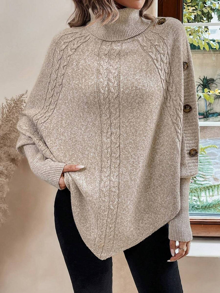 Alexis | Poncho-Sweater mit hohem Kragen und Fledermausärmeln, asymmetrischer Kabelstrick-Pullover